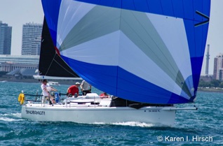 Sailboat with spinnaker at start of Race to Mackinac